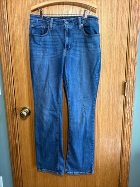 Levi's 725 High Rise Bootcut Jeans Blue Denim Dark Wash
Stretch women Size 32x31